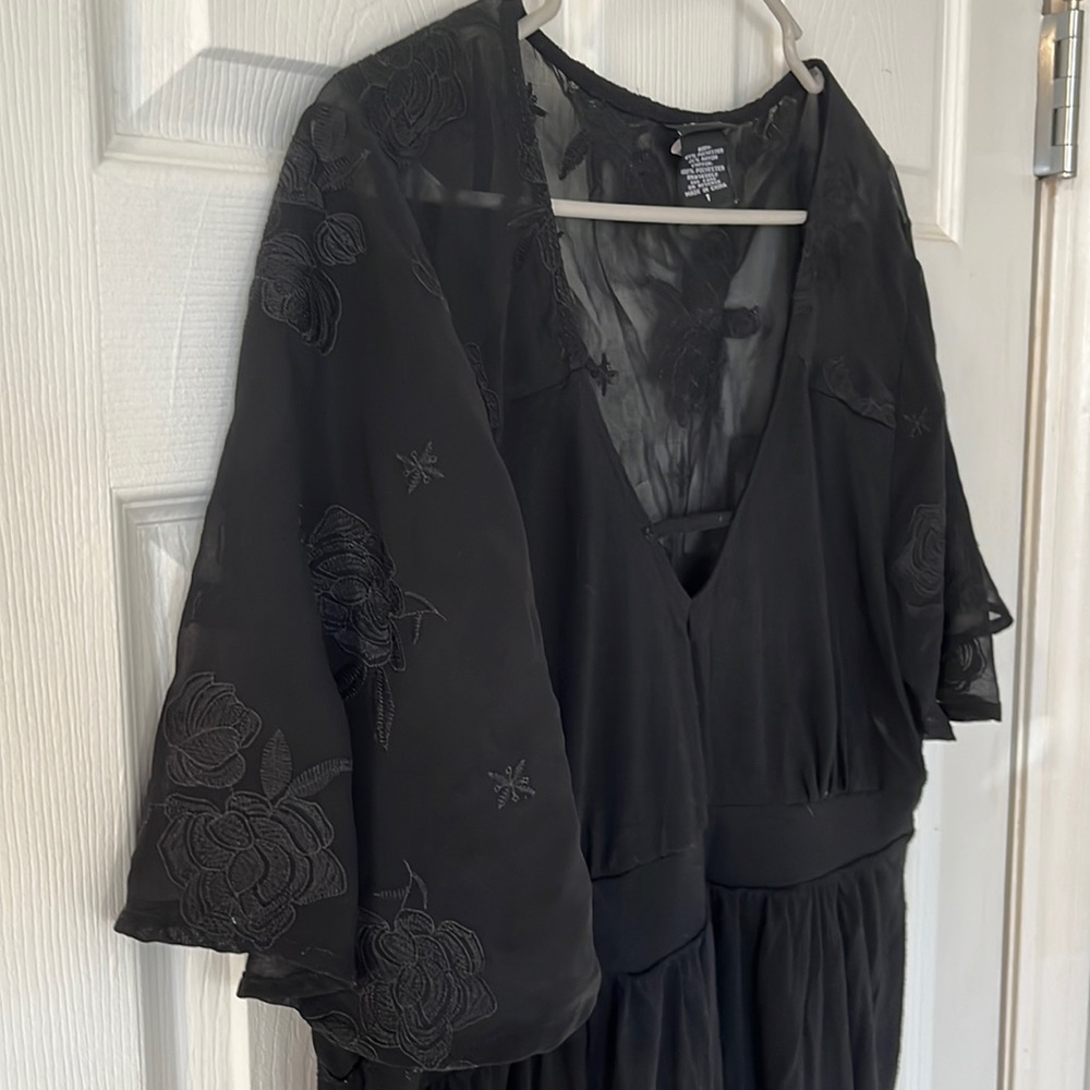 Torrid top, half sheer back with floral pattern, size 1